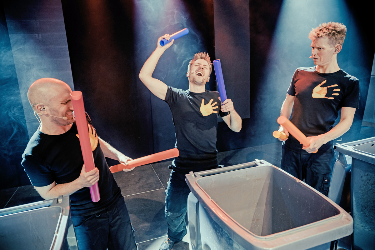 HeartBeat group grooving with trashcans and sticks.